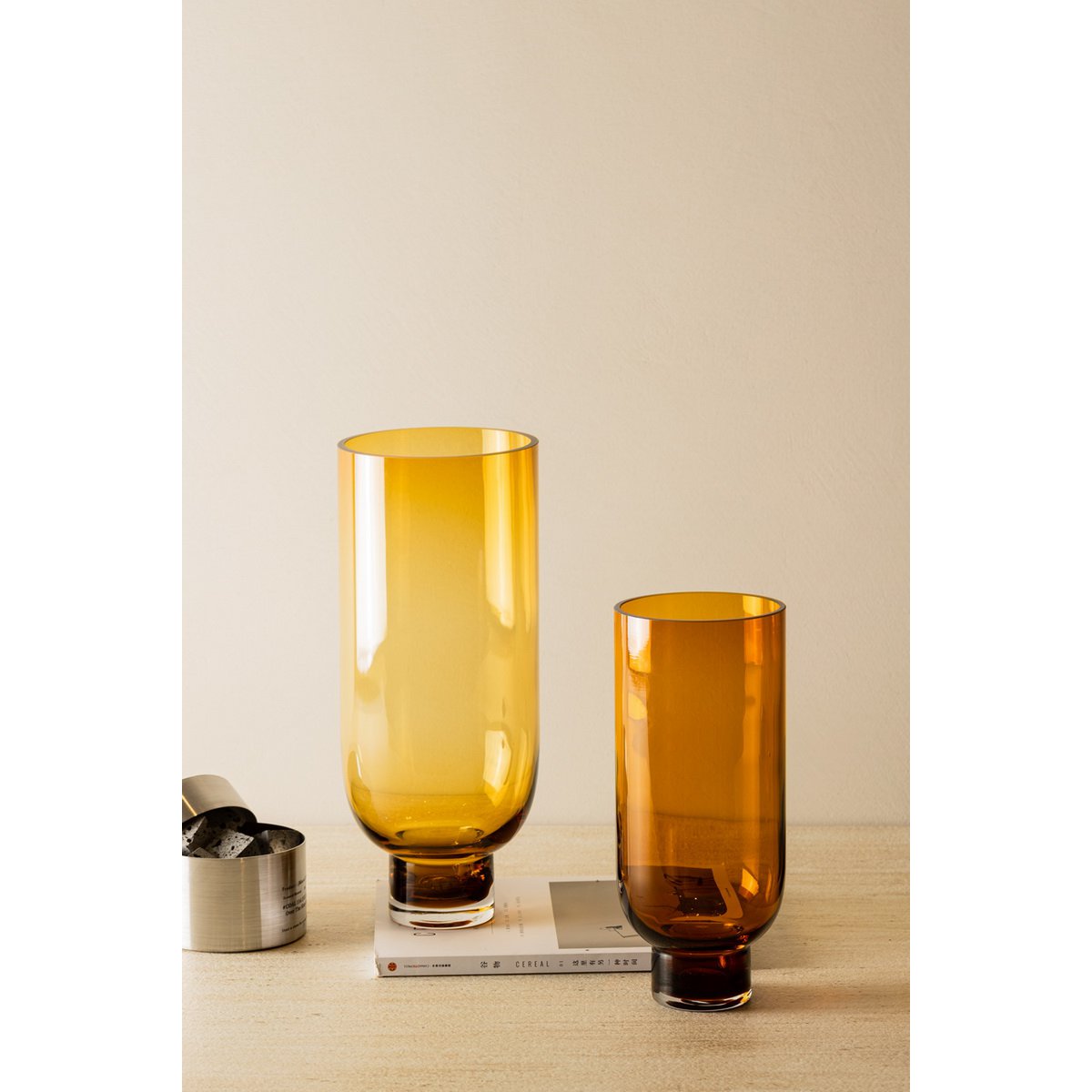 Sober modern tall glass vase, cylindrical shape on a solid base, warm dark orange, OMAHA18AM