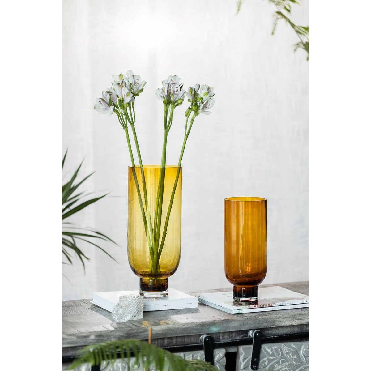 Sober modern tall glass vase, cylindrical shape on a solid base, warm dark orange, OMAHA18AM